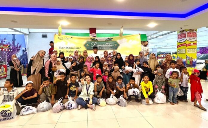 Akhiri Program Ramadhan Berkah, Bank Aceh Cabang Lhokseumawe Belanjakan Baju Lebaran Untuk Puluhan Anak Yatim